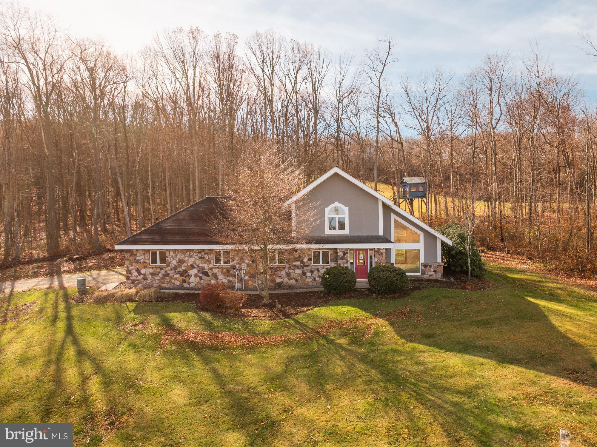 4007 White Rock Road Friendsville, MD 21531 - Photo 2 of 39 a front view of a house with a yard
