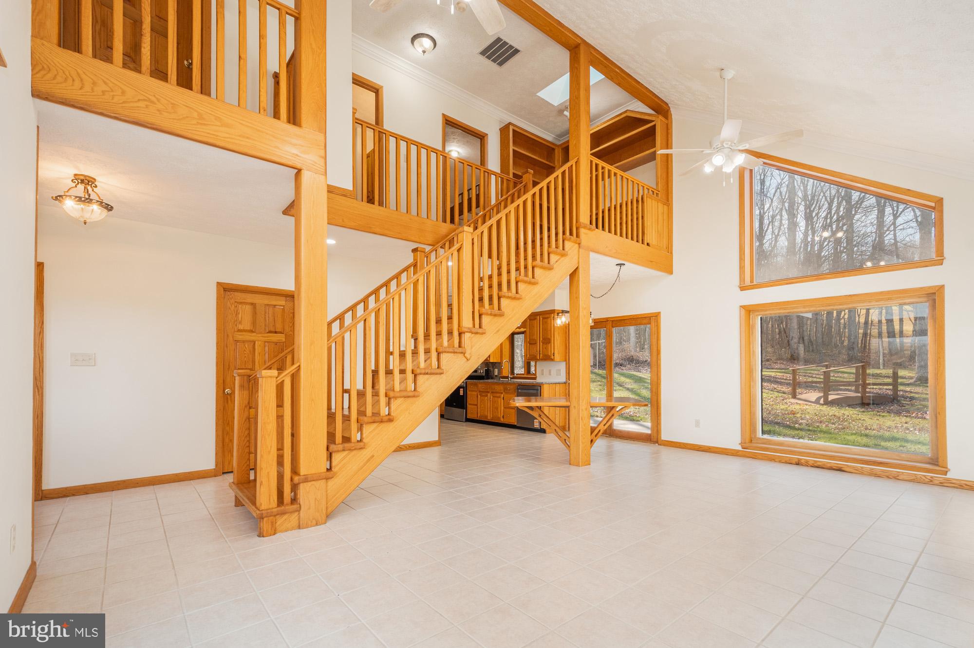 4007 White Rock Road Friendsville, MD 21531 - Photo 22 of 39 a view of an entryway with staircase