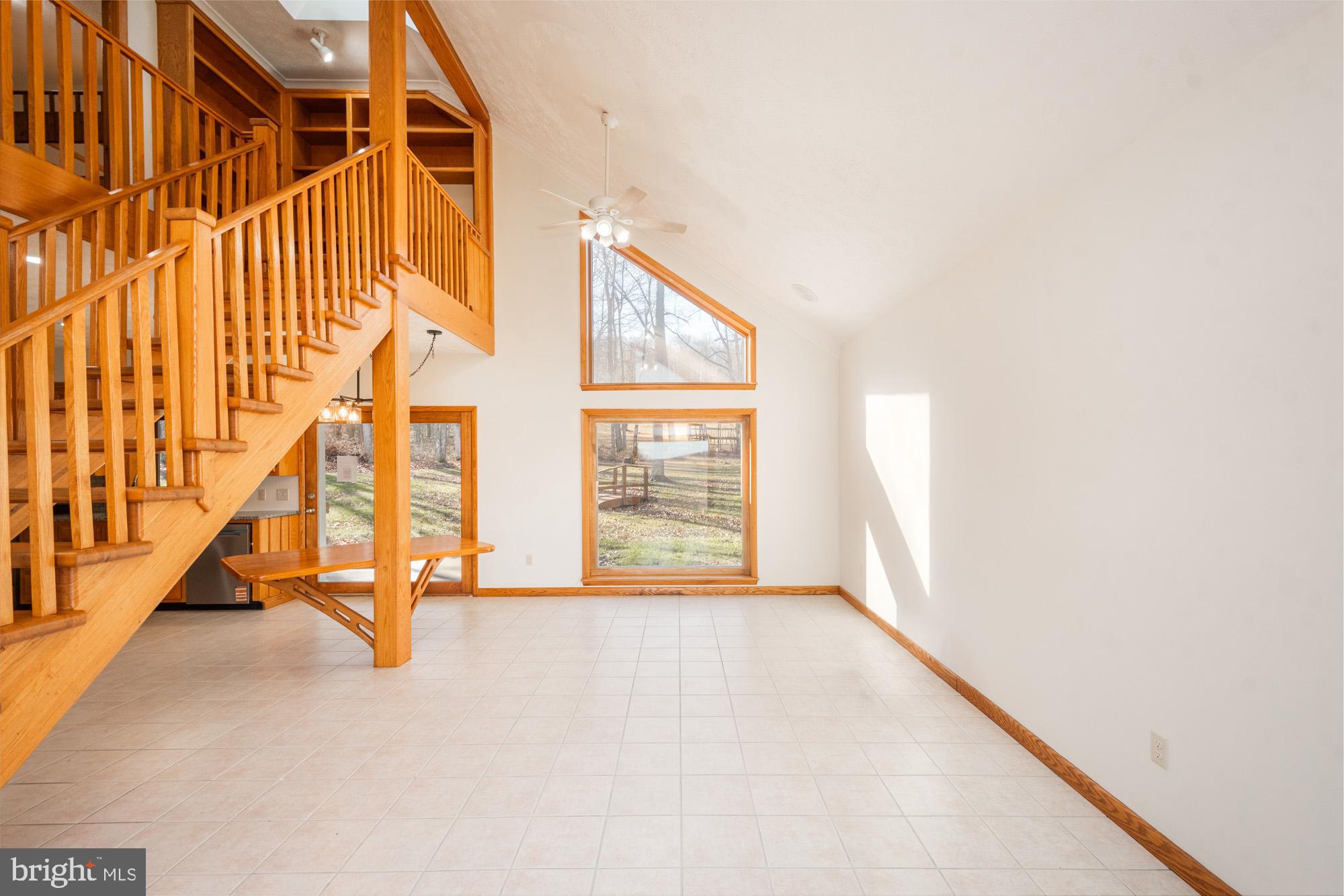4007 White Rock Road Friendsville, MD 21531 - Photo 23 of 39 a view of an empty room with stairs