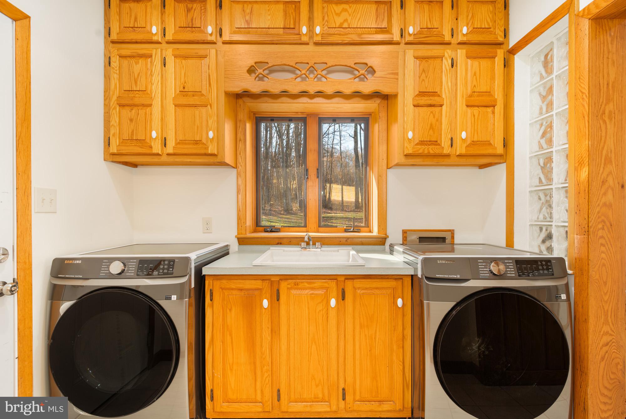 4007 White Rock Road Friendsville, MD 21531 - Photo 30 of 39 a view of a hallway with washer and dryer