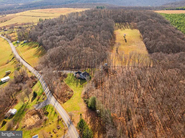 a view of swimming pool from a lake view