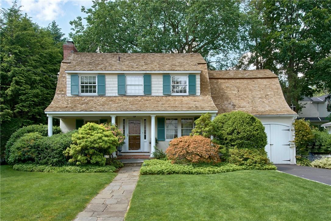 a aerial view of a house with a yard