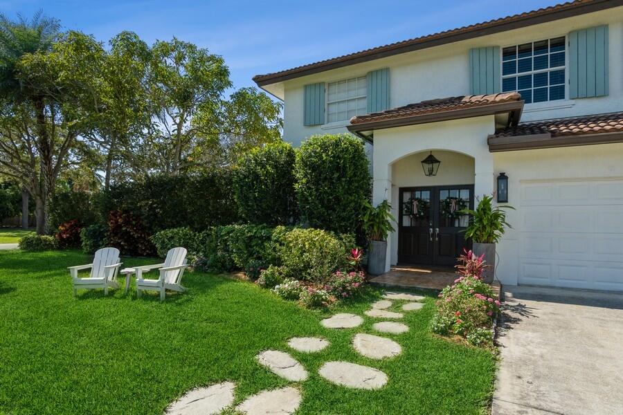 6031 Robinson Street Jupiter, FL 33458 - Photo 2 of 44 05_6031RobinsonSt_574_FrontView_Small