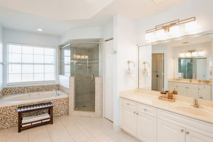 6031 Robinson Street Jupiter, FL 33458 - Photo 21 of 44 24_6031RobinsonSt_13_PrimaryBathroom_Sma