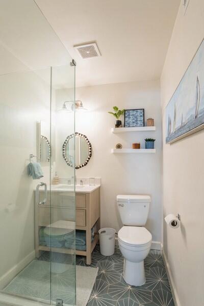 6031 Robinson Street Jupiter, FL 33458 - Photo 28 of 44 31_6031RobinsonSt_8_Bathroom_Small