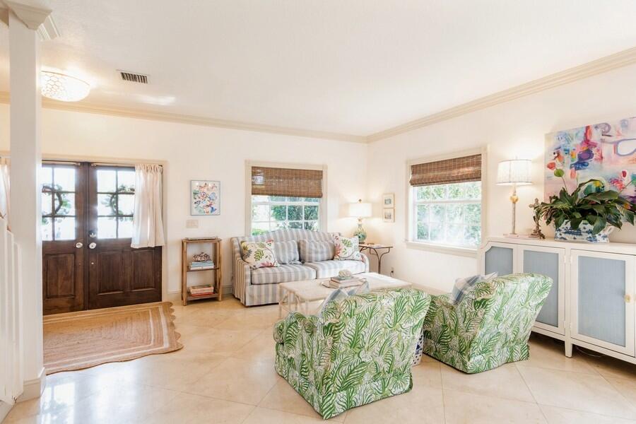 6031 Robinson Street Jupiter, FL 33458 - Photo 4 of 44 07_6031RobinsonSt_148_FoyerLivingRoom_Sm