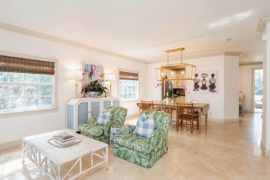 6031 Robinson Street Jupiter, FL 33458 - Photo 6 of 44 09_6031RobinsonSt_165_LivingRoom_Small