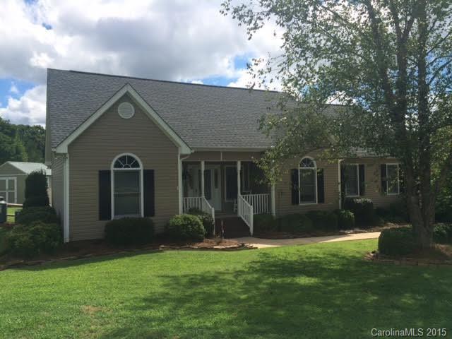 6106 Olive Branch Road Wingate, NC 28174 - Photo 1 of 19 a front view of a house with a yard