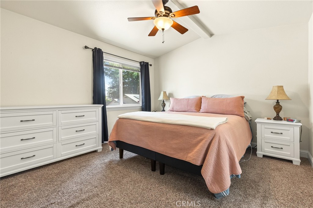 38 Kobe Loop Chico, CA 95973 - Photo 25 of 38 a spacious bedroom with a bed and a window