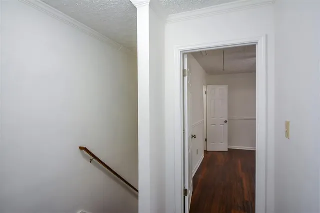 a view of a bathroom from a hallway