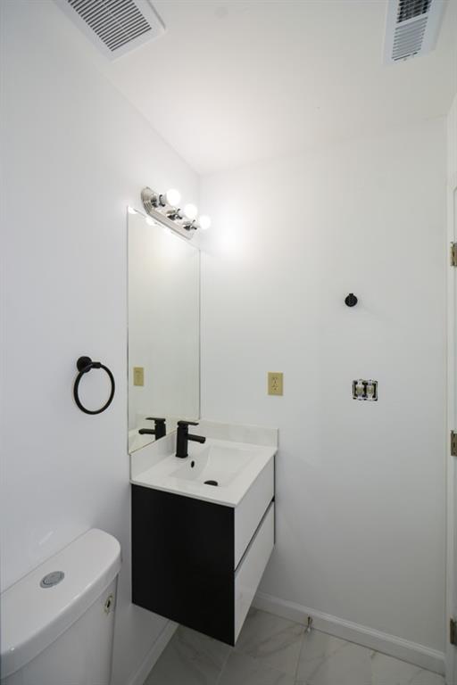 2340 Beaver Ruin Road, Unit UN26 Norcross, GA 30071 - Photo 35 of 42 a bathroom with a sink and a mirror