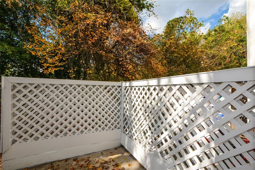2340 Beaver Ruin Road, Unit UN26 Norcross, GA 30071 - Photo 41 of 42 a bathroom with a bathtub and shower