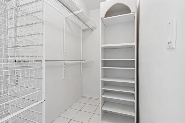 a view of an empty walk in closet