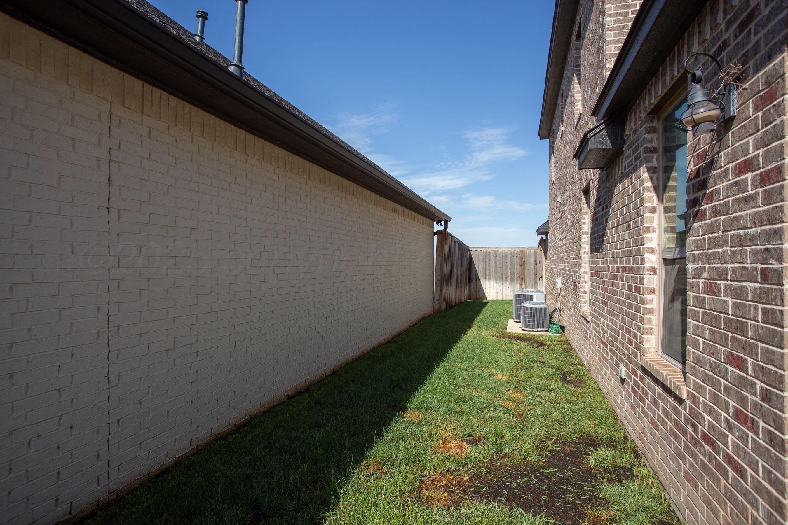 5708 Wesley Road Amarillo, TX 79119 - Photo 30 of 33 Side yard