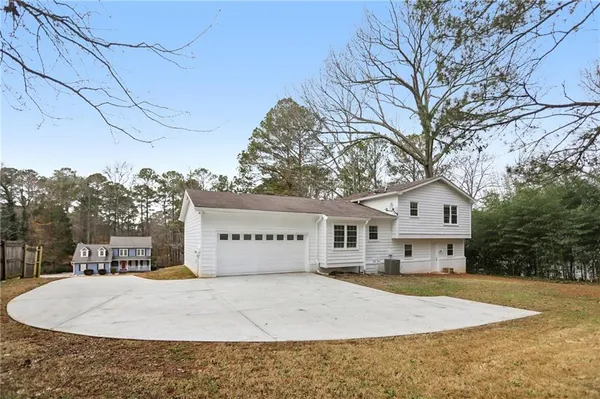 a view of balcony with wooden floor and fence