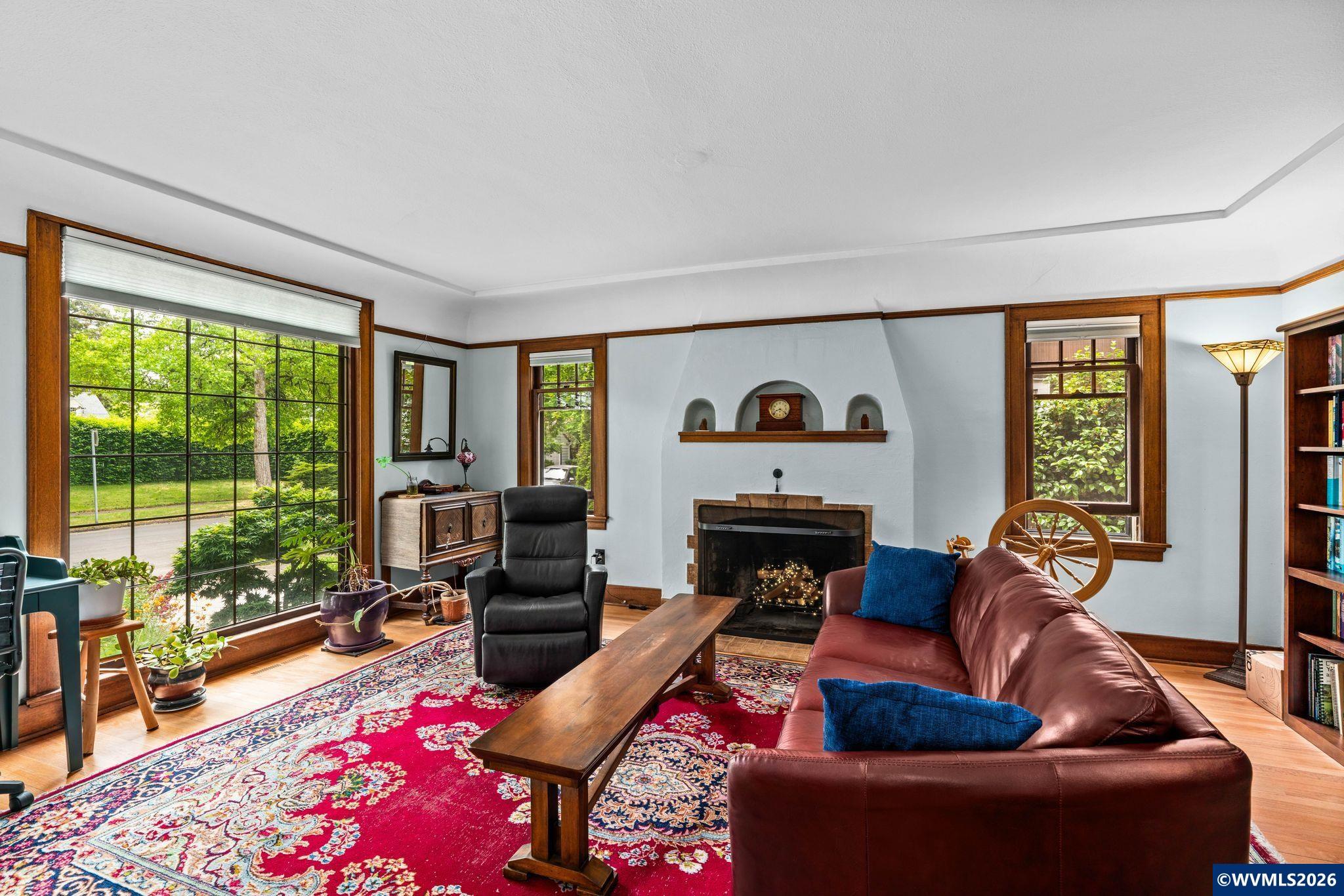 444 Northwest 35th Street Corvallis, OR 97330 - Photo 7 of 40 a living room with furniture and a fireplace