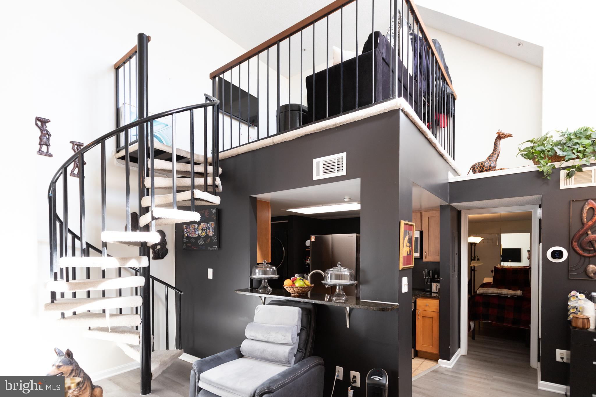 14111 Yardarm Way, Unit 1209 Laurel, MD 20707 - Photo 8 of 29 a view of living room and dining room