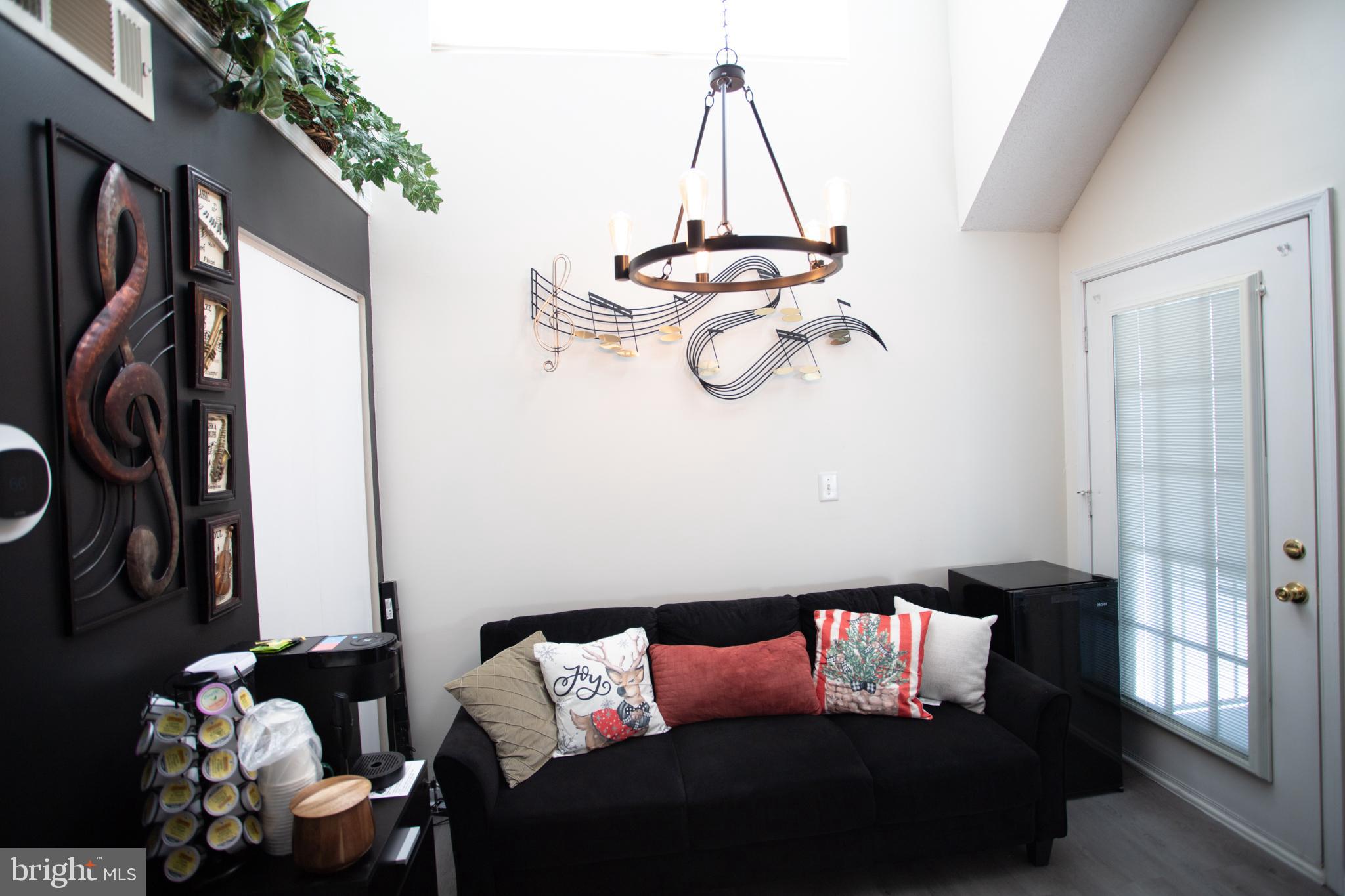 14111 Yardarm Way, Unit 1209 Laurel, MD 20707 - Photo 9 of 29 a living room with furniture