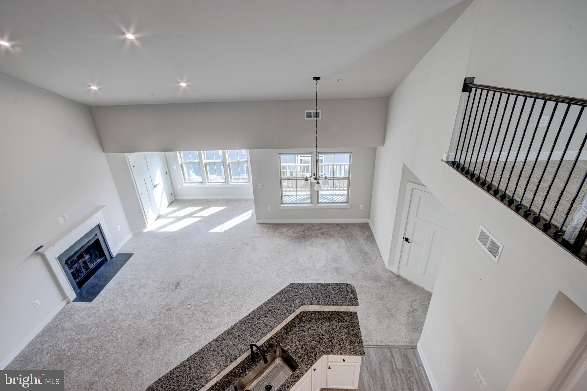 3282 Pine Needle Circle, Unit 403 Frederick, MD 21704 - Photo 12 of 49 View from loft & gas fireplace