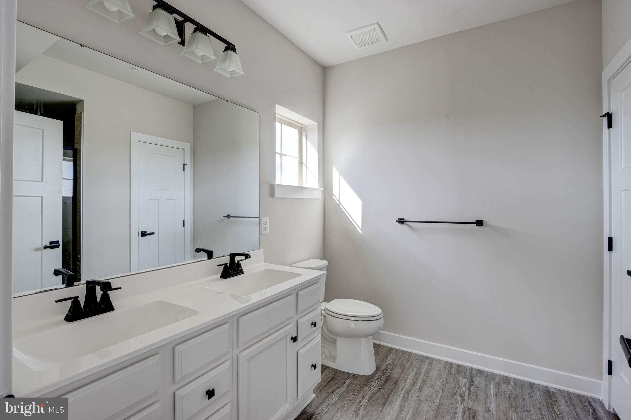 3282 Pine Needle Circle, Unit 403 Frederick, MD 21704 - Photo 22 of 49 Dual sinks in Primary bathroom