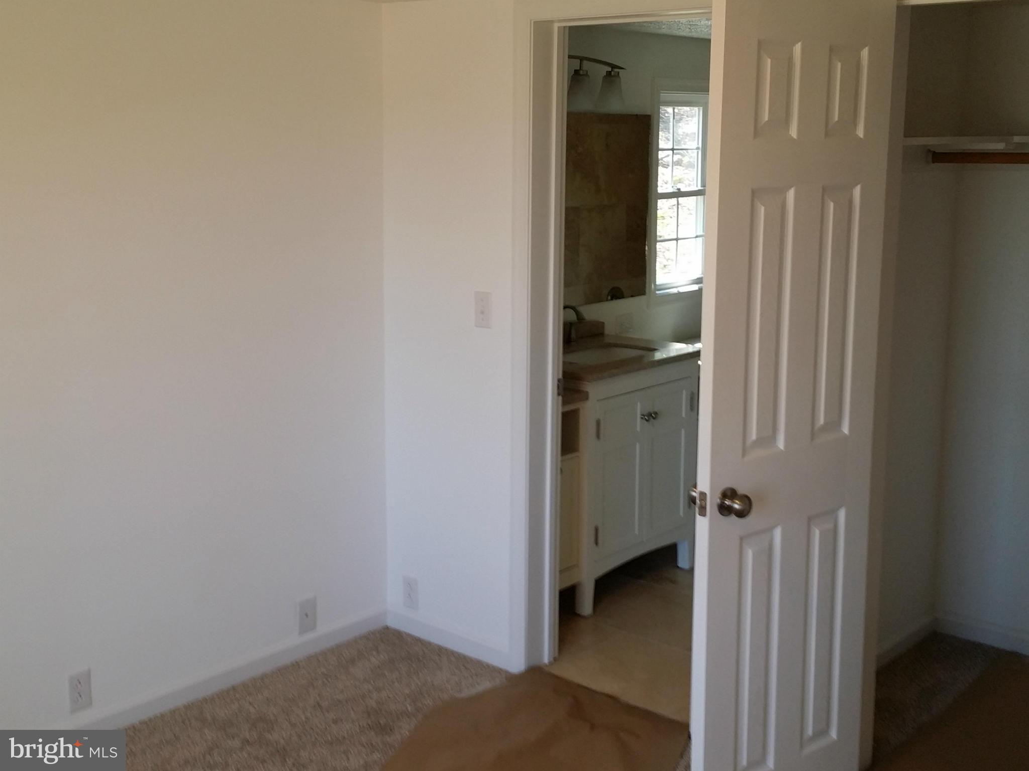 9250 Tetotum Road King George, VA 22485 - Photo 17 of 30 To the master bathroom