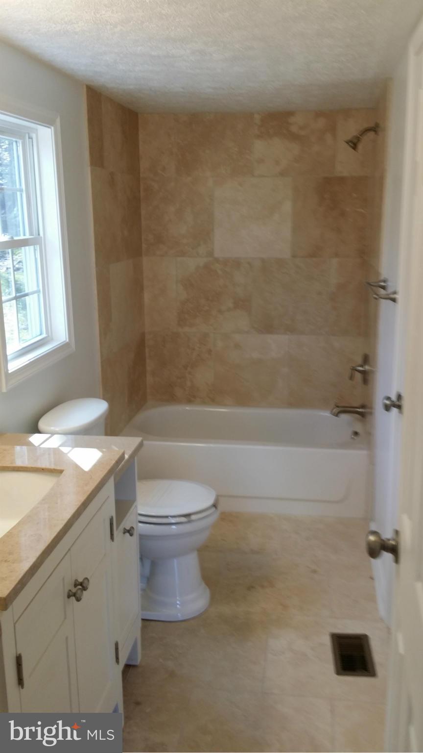 9250 Tetotum Road King George, VA 22485 - Photo 20 of 30 18"x18" travertine tile