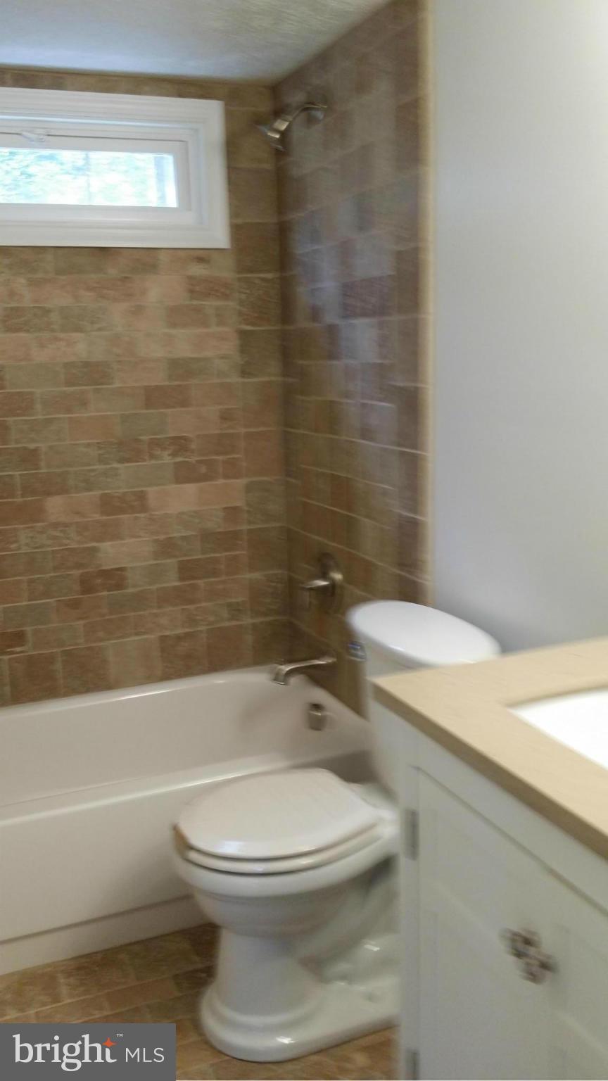 9250 Tetotum Road King George, VA 22485 - Photo 24 of 30 Tumbled marble tile