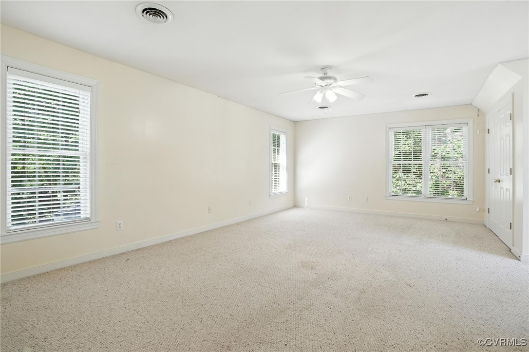 8248 Hampton Arbor Circle Chesterfield, VA 23832 - Photo 28 of 41 an empty room with a window and ceiling fan