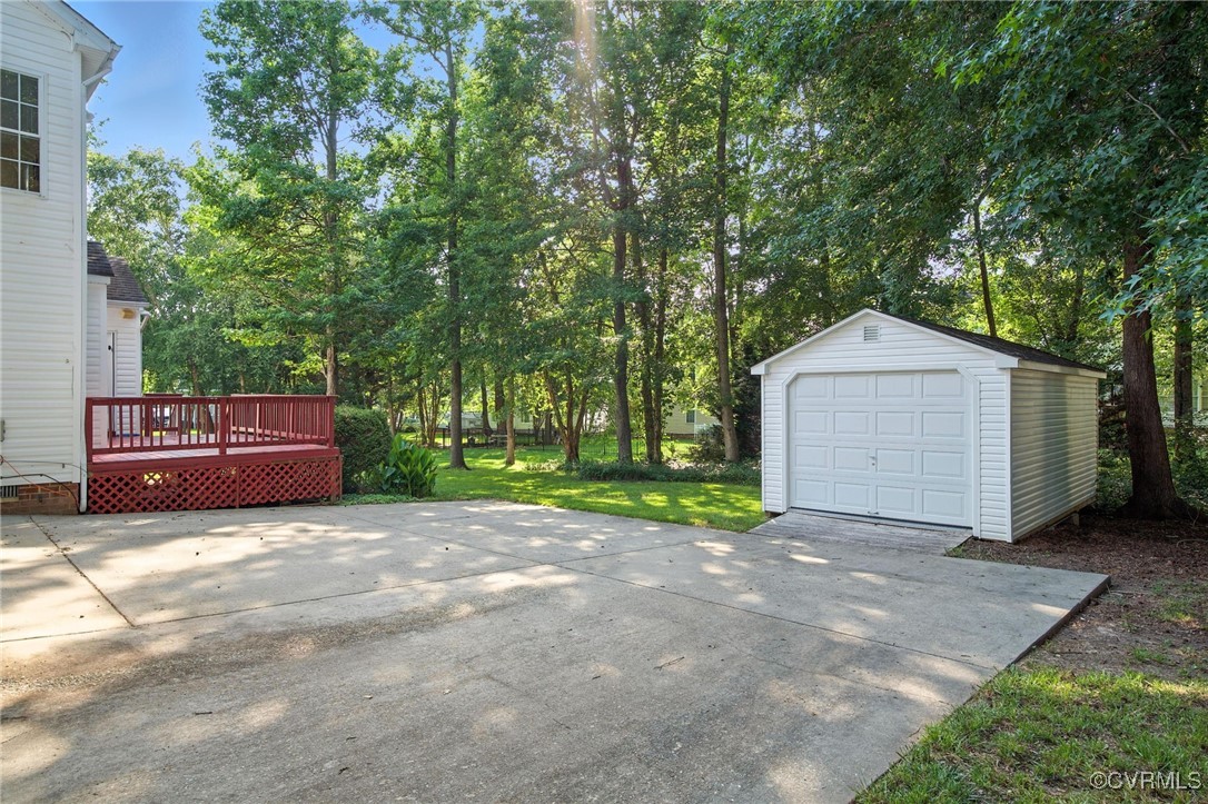 8248 Hampton Arbor Circle Chesterfield, VA 23832 - Photo 38 of 41 a front view of a house with a yard and garage