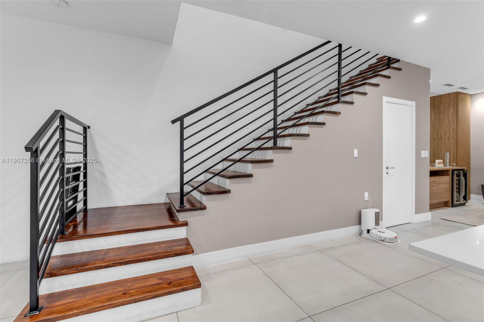3048 Southwest 18th Street, Unit 3048 Miami, FL 33145 - Photo 13 of 39 a view of entryway and hall with wooden floor