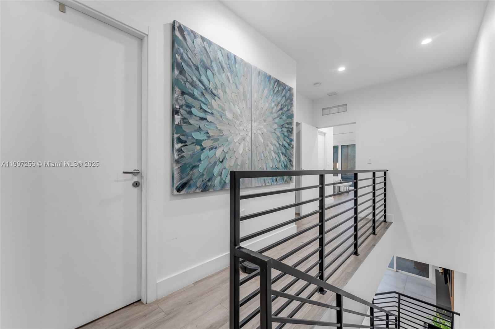 3048 Southwest 18th Street, Unit 3048 Miami, FL 33145 - Photo 14 of 39 a view of entryway with wooden floor