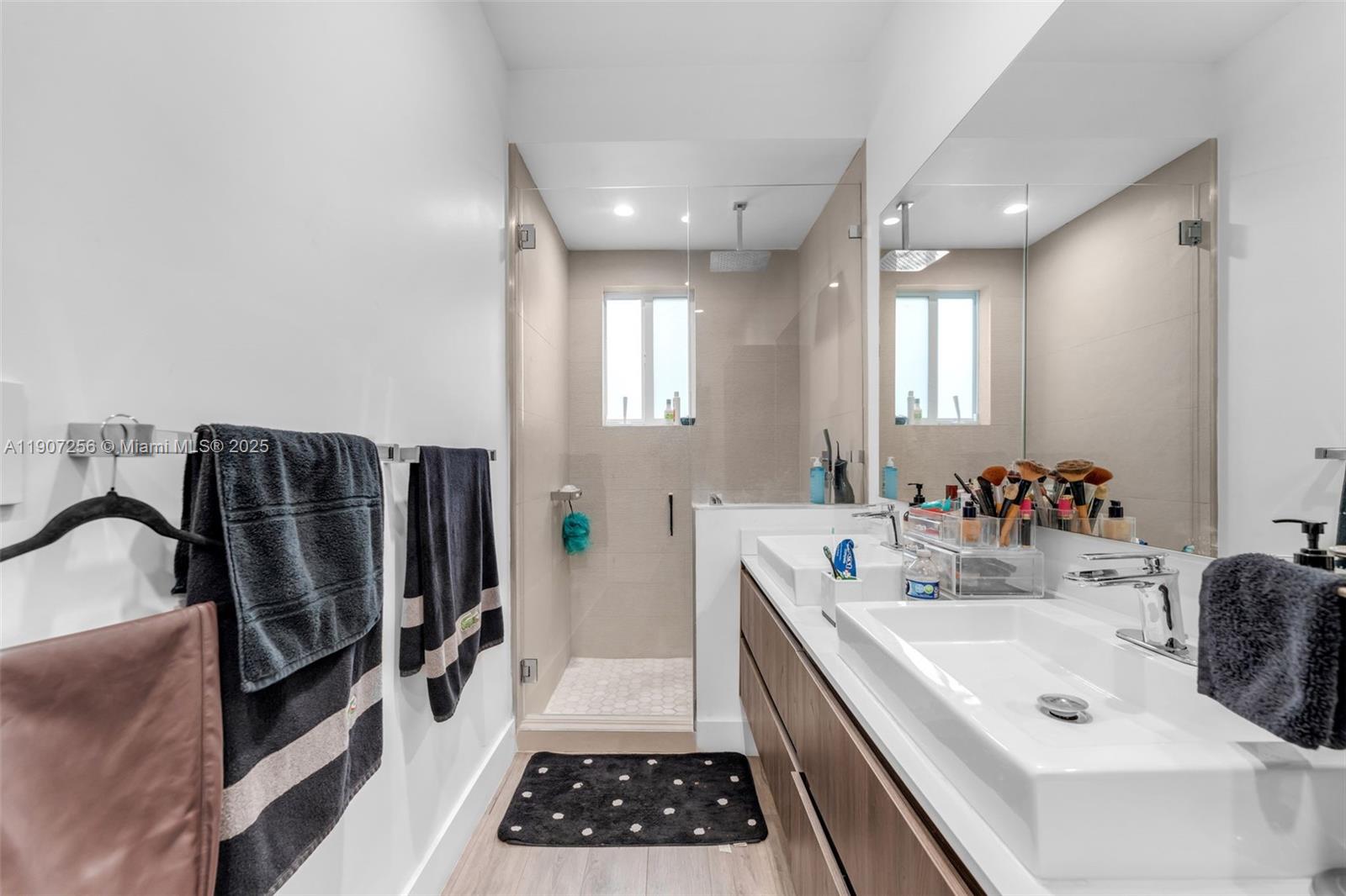 3048 Southwest 18th Street, Unit 3048 Miami, FL 33145 - Photo 18 of 39 a kitchen with sink a refrigerator and a stove