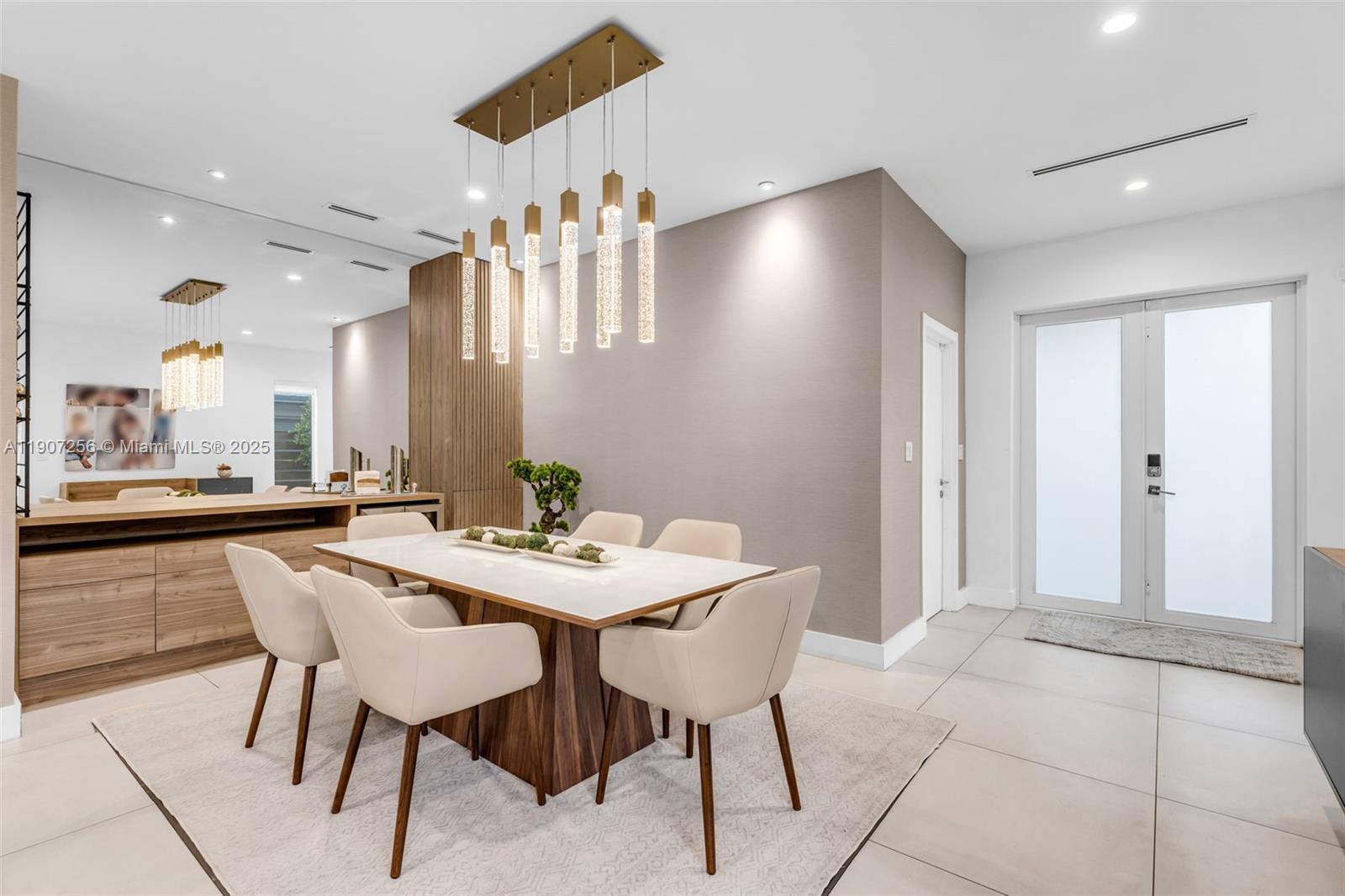 3048 Southwest 18th Street, Unit 3048 Miami, FL 33145 - Photo 2 of 39 a view of a dining room with furniture and a large window