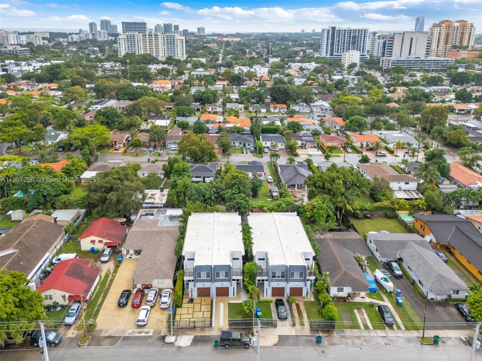 3048 Southwest 18th Street, Unit 3048 Miami, FL 33145 - Photo 36 of 39 an aerial view of residential houses with city view