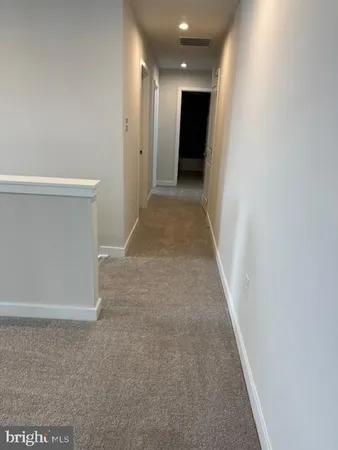 a view of hallway with stairs