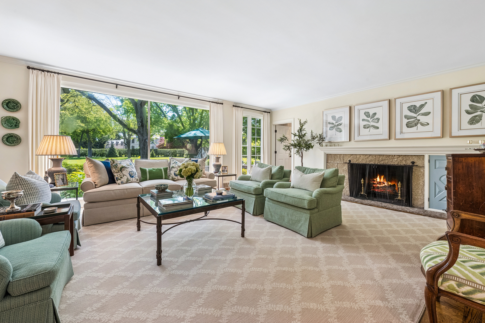 936 Sunset Road Winnetka, IL 60093 - Photo 10 of 50 a living room with furniture and a fireplace