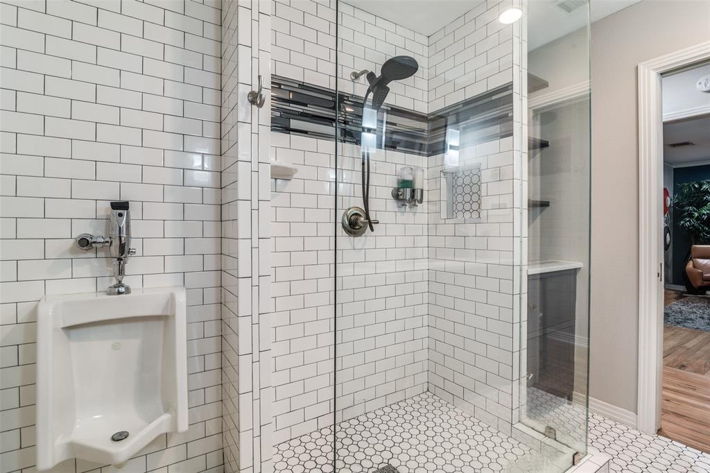 3714 Valley Ridge Road Dallas, TX 75220 - Photo 17 of 26 a bathroom with a shower