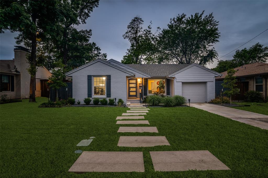 3714 Valley Ridge Road Dallas, TX 75220 - Photo 2 of 26 a front view of a house with a yard
