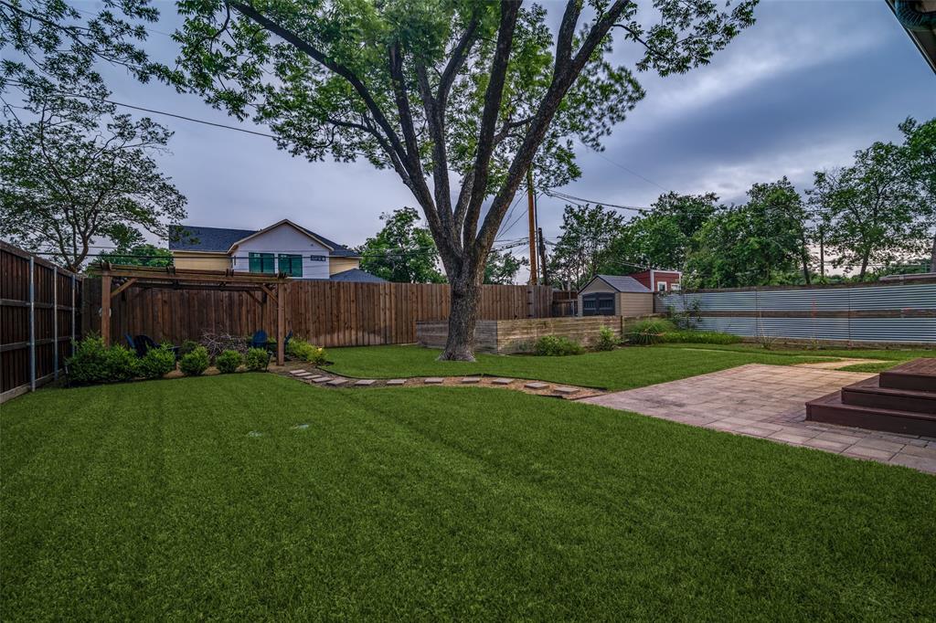 3714 Valley Ridge Road Dallas, TX 75220 - Photo 24 of 26 a view of a backyard with garden and entertaining space