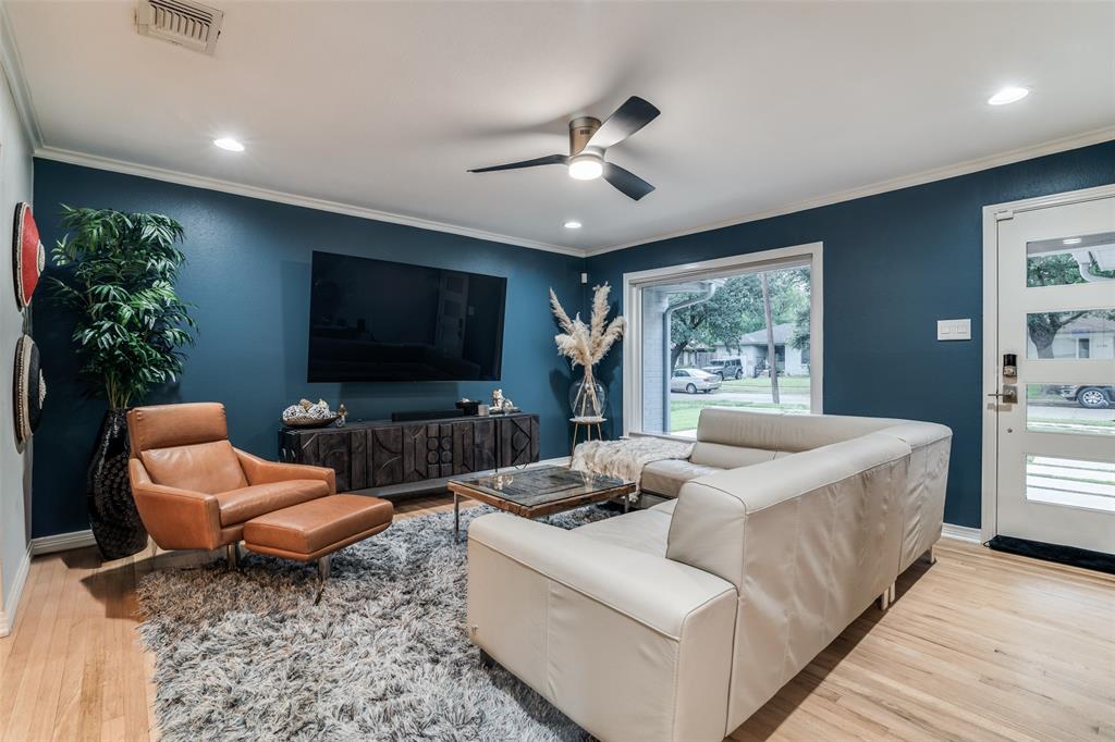 3714 Valley Ridge Road Dallas, TX 75220 - Photo 3 of 26 a living room with furniture and a flat screen tv