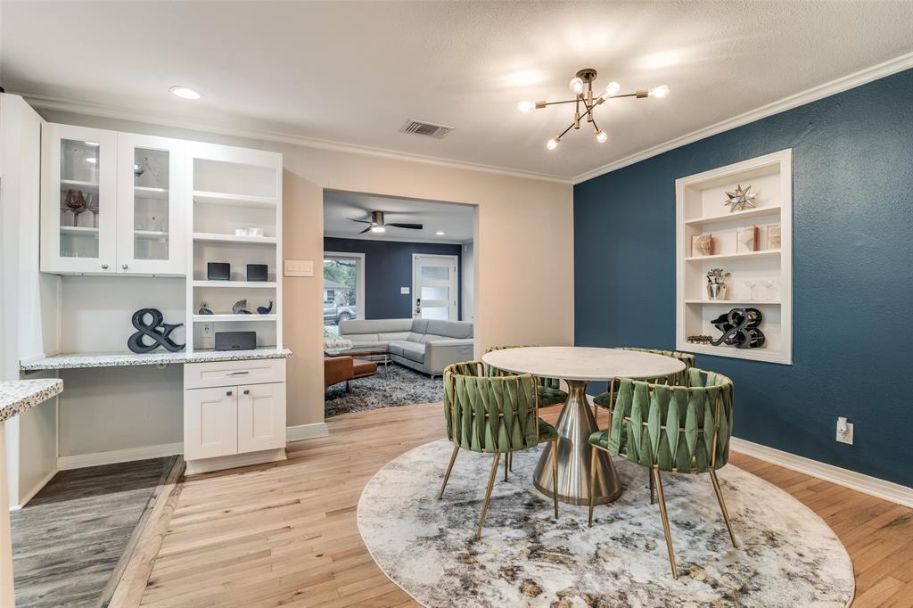 3714 Valley Ridge Road Dallas, TX 75220 - Photo 7 of 26 a view of a dining room with furniture and wooden floor