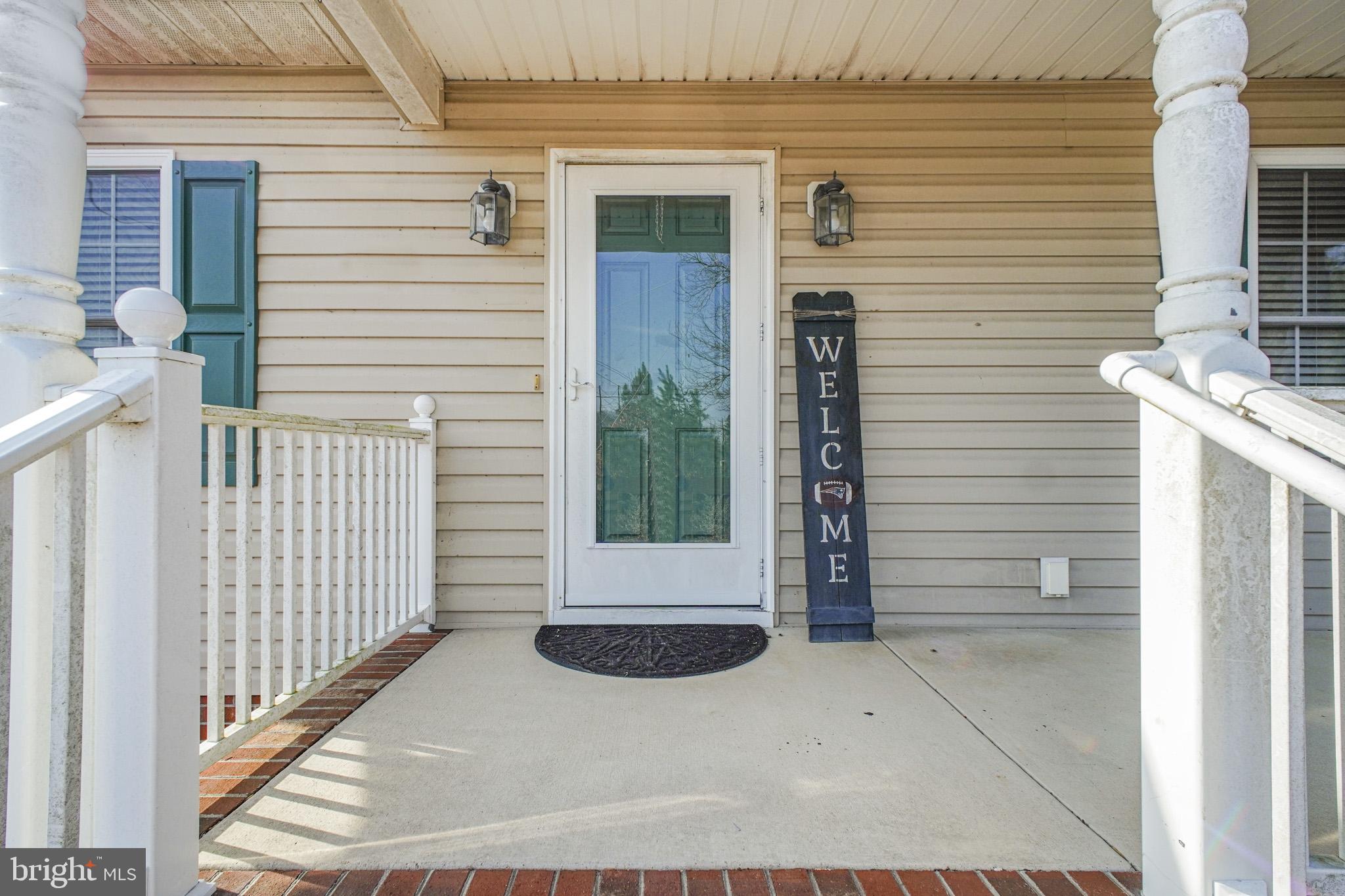 12254 Birkdale Road Ruther Glen, VA 22546 - Photo 23 of 68 a view of entrance gate of a house