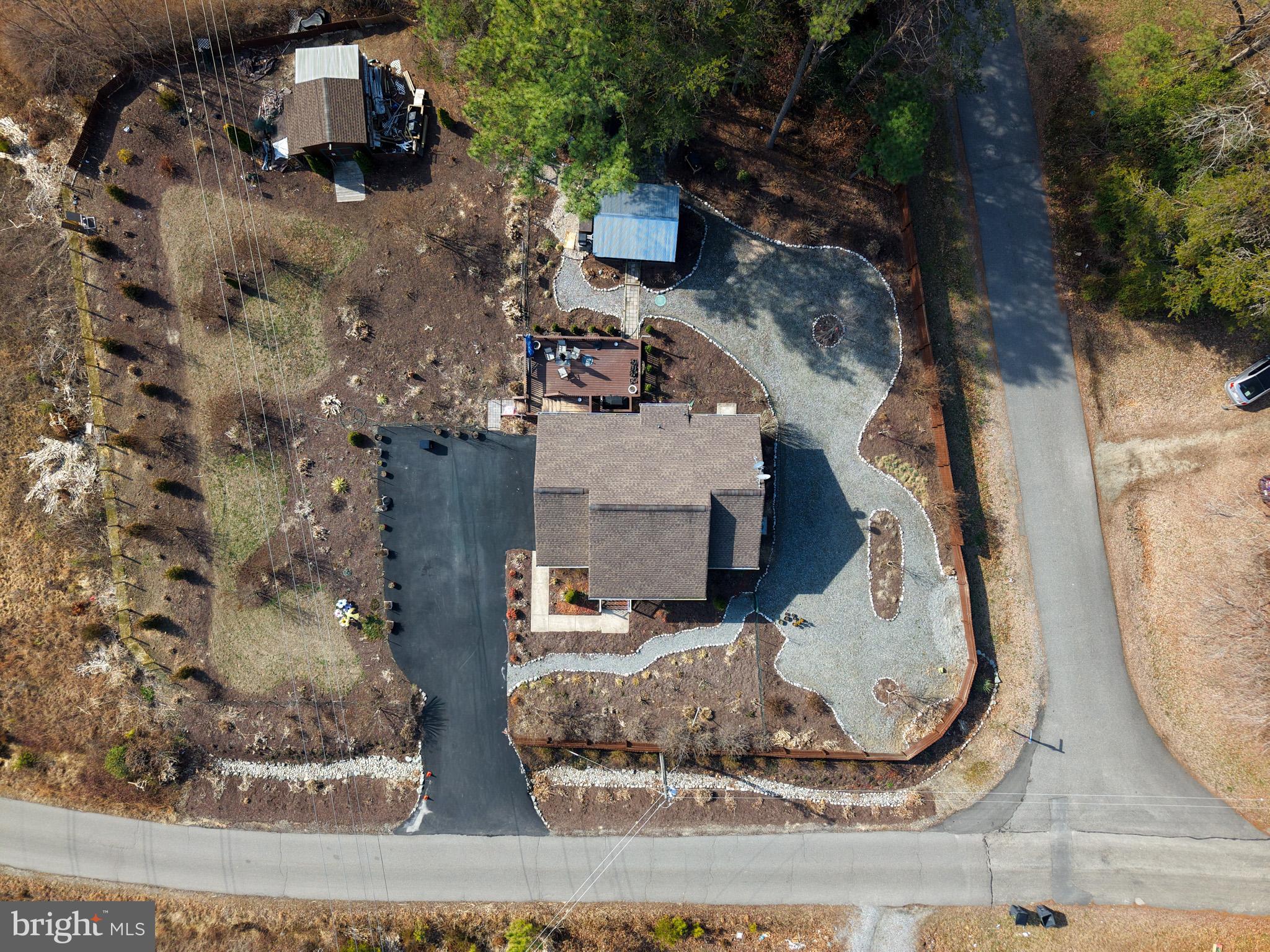12254 Birkdale Road Ruther Glen, VA 22546 - Photo 53 of 68 an aerial view of a house with a yard