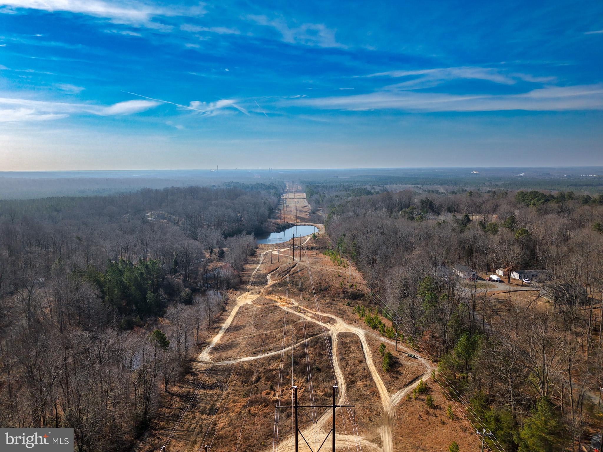 12254 Birkdale Road Ruther Glen, VA 22546 - Photo 60 of 68 a view of a yard with an ocean