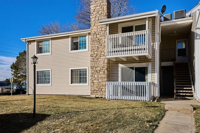 a porch with a chair