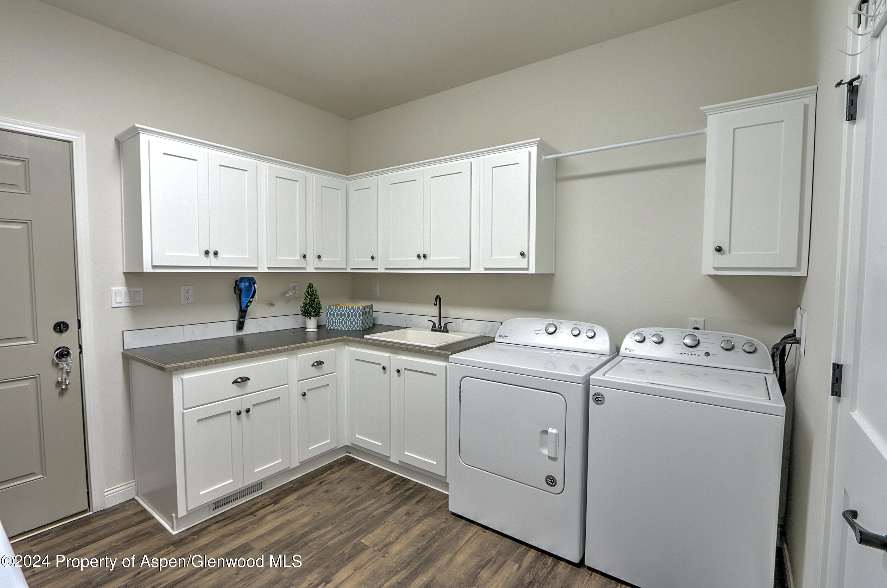 227 Lava Drive El Jebel, CO 81621 - Photo 15 of 38 a view of kitchen with white cabinets