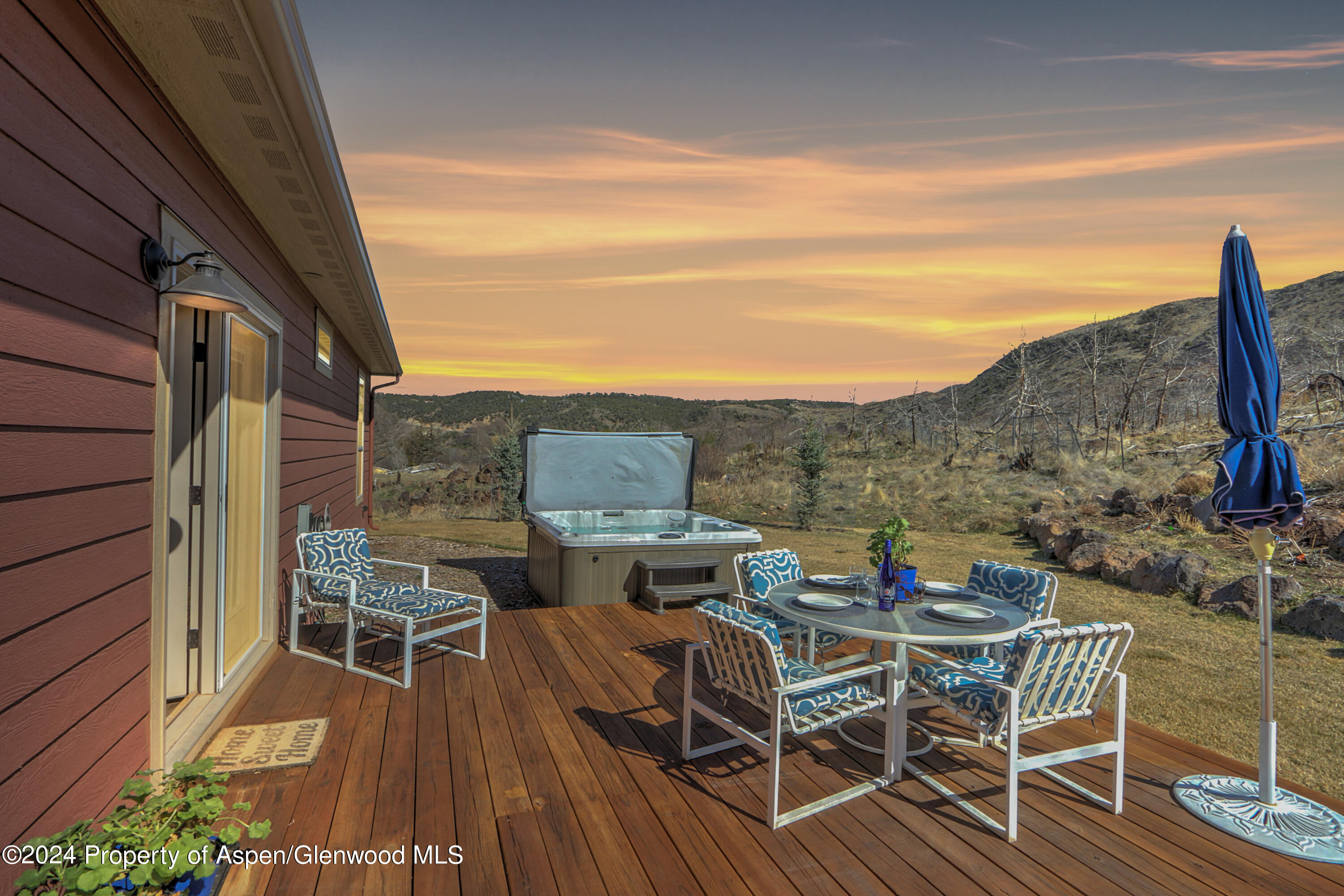 227 Lava Drive El Jebel, CO 81621 - Photo 21 of 38 a view of a terrace with furniture and stove