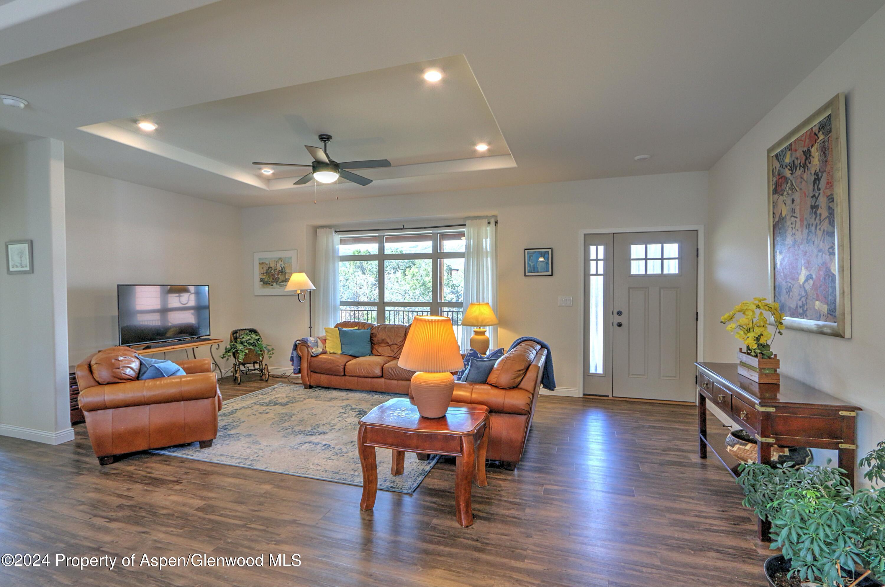 227 Lava Drive El Jebel, CO 81621 - Photo 4 of 38 a living room with furniture and a window