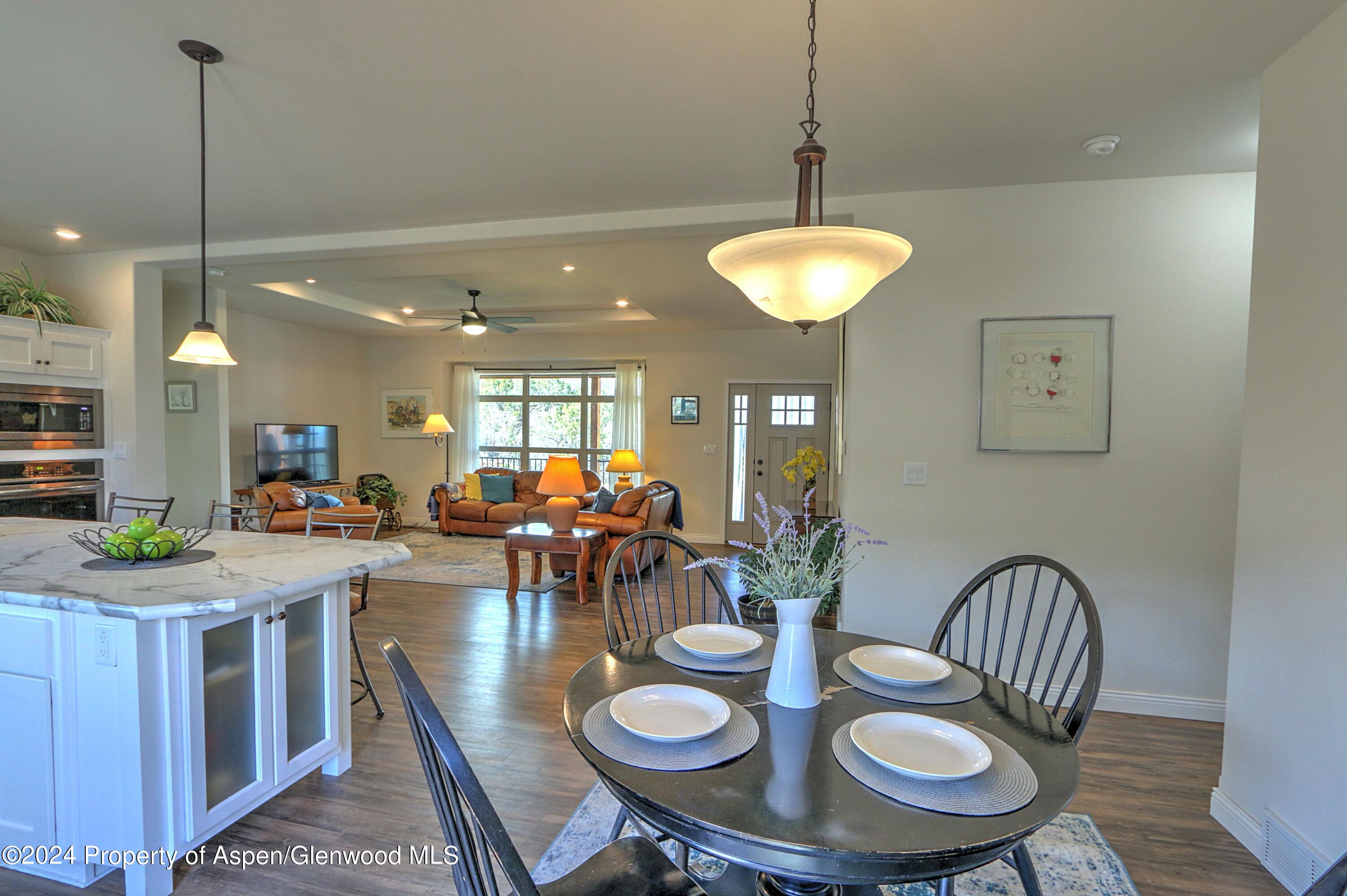 227 Lava Drive El Jebel, CO 81621 - Photo 9 of 38 a view of a dining room and livingroom furniture