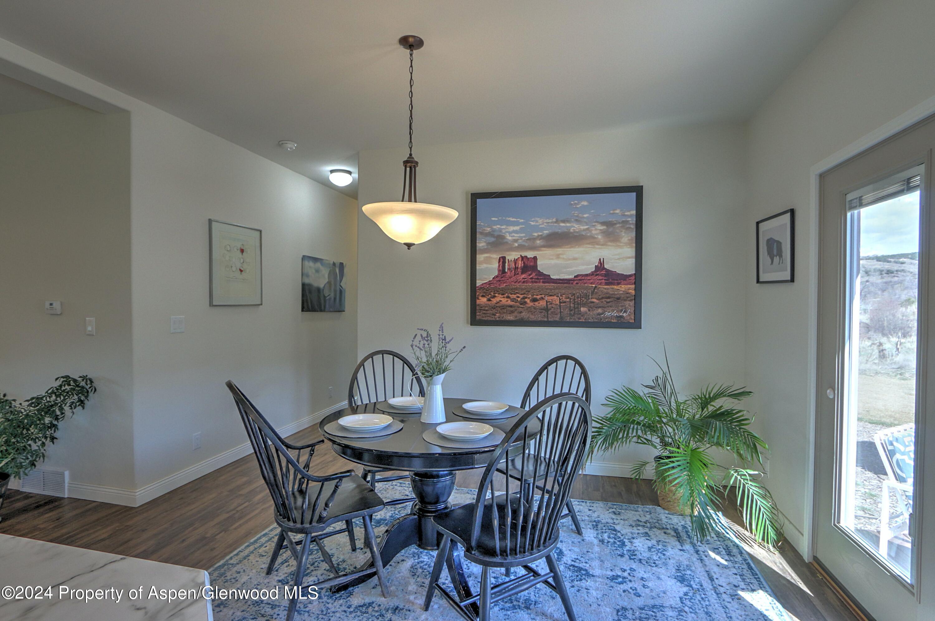 227 Lava Drive El Jebel, CO 81621 - Photo 10 of 38 a view of a dining room with furniture window and outside view